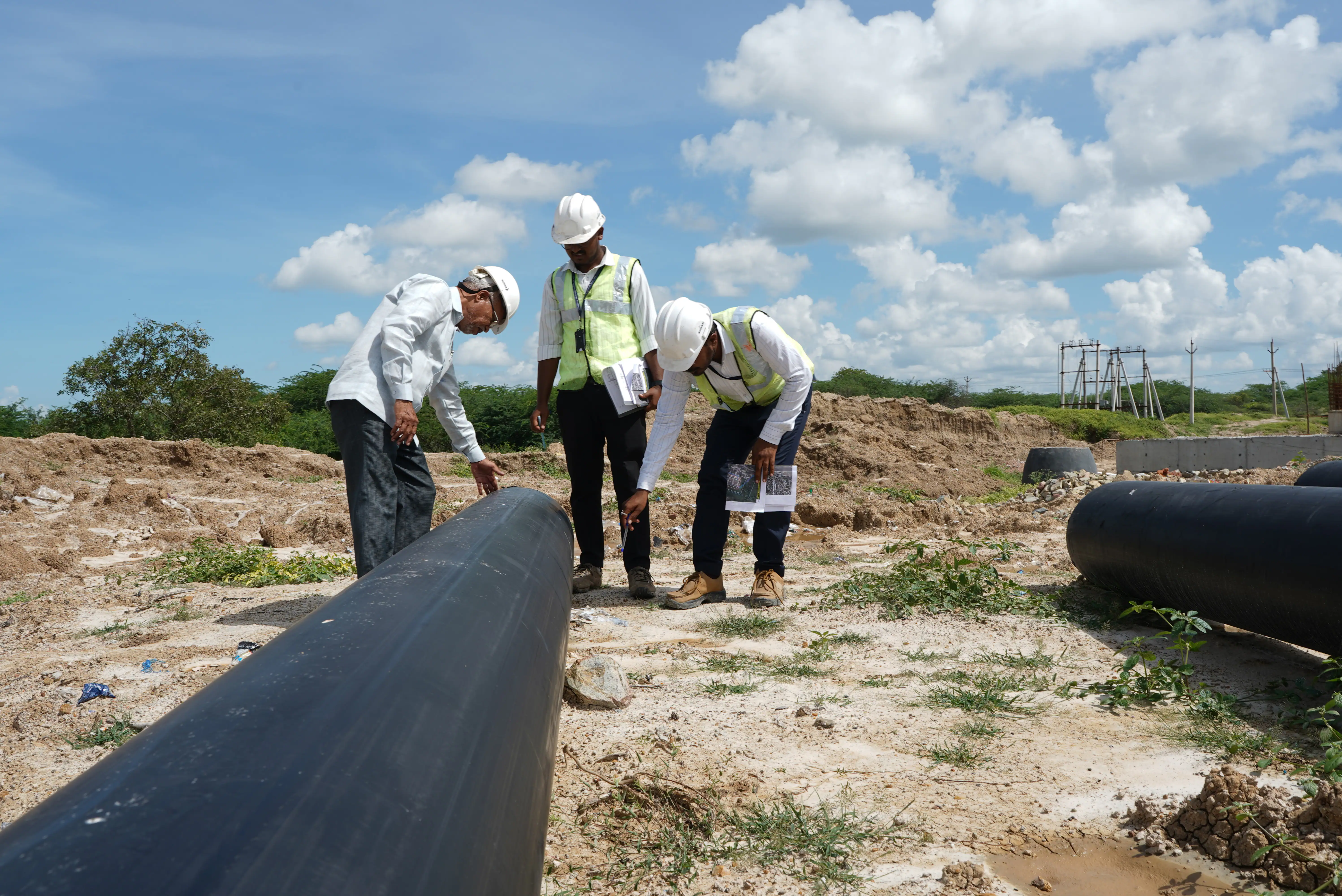 Engineers working on underground drainage infrastructure